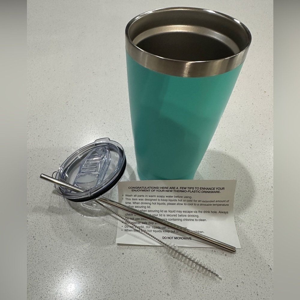 New never used Thermo Plastic cup with Stainless steel straw, lid, and brush.